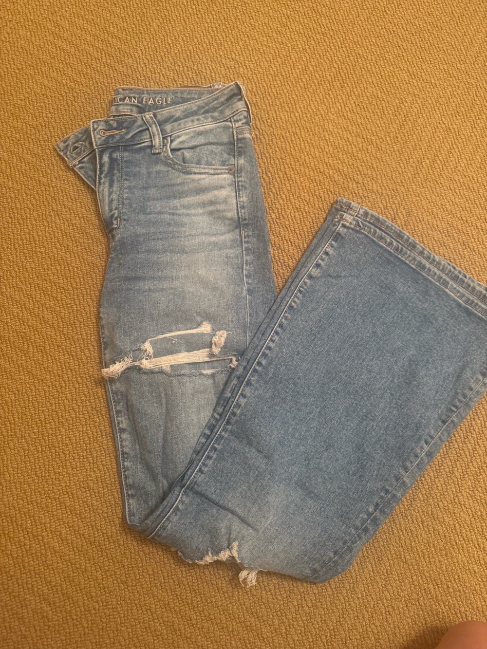 American Eagle Outfitters light blue denim jeans with contrast stitching